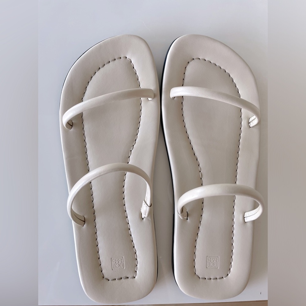 Toteme the city leather slides